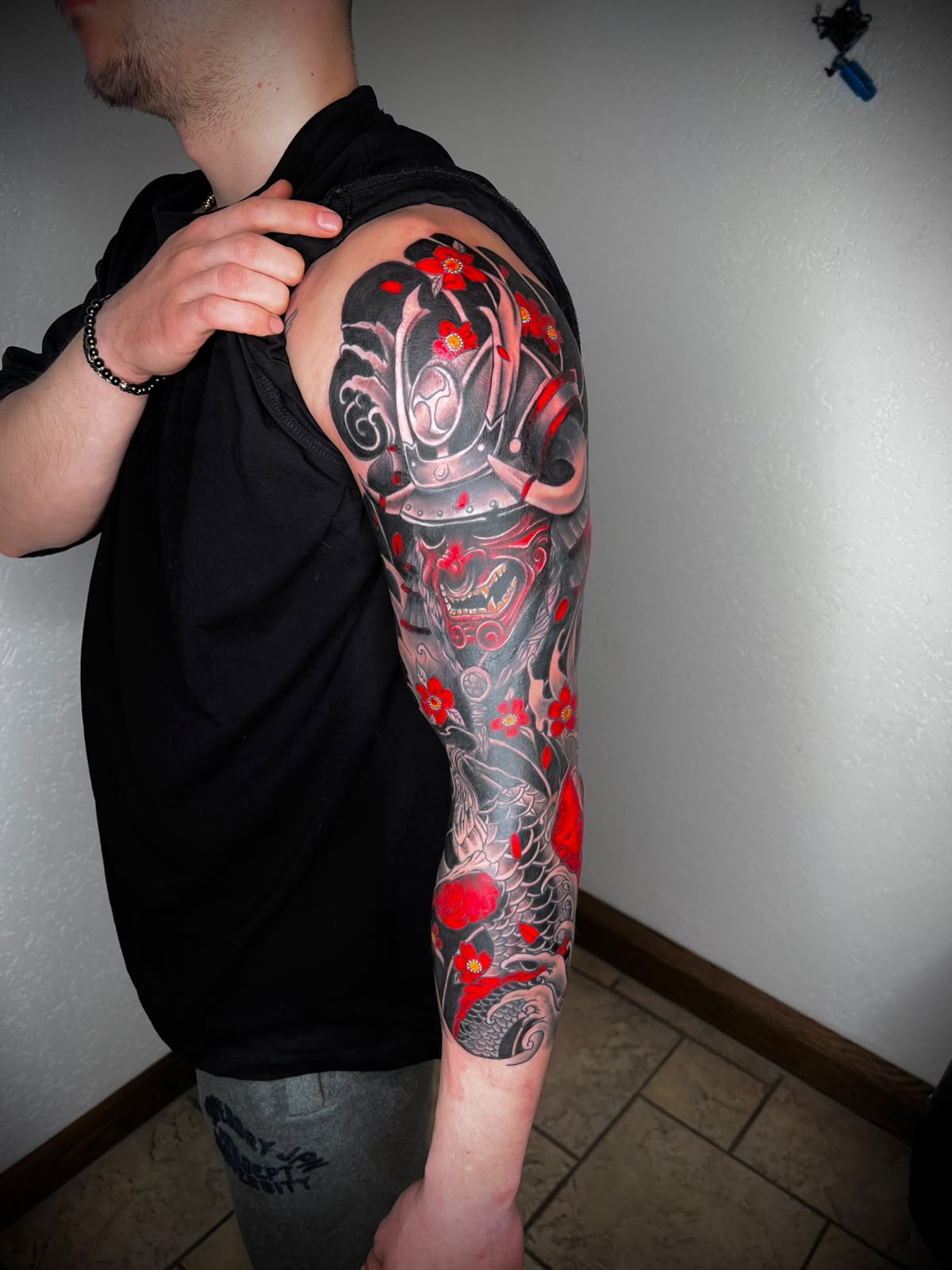 Taucher in Rot & Schwarz — Tattoo von Ciprian Grapa
